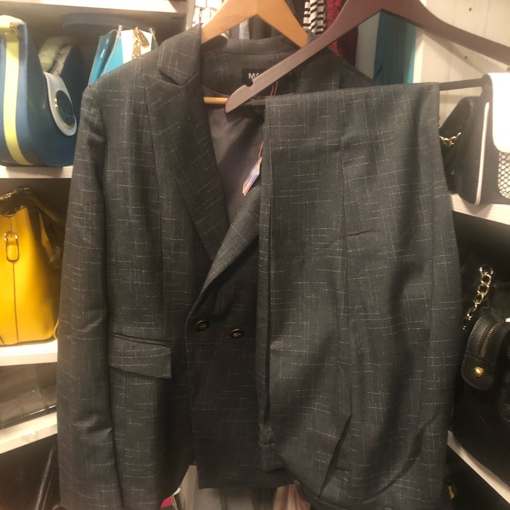 2  piece suits.  Never worn, with tags. L to XL